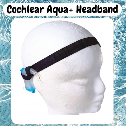 A white foam head wearing a black cochlear implant aqua plus swim headband with a blue attachment, against a blue water background.