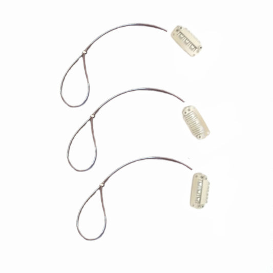 Three BAHA retaining lines with wig clips