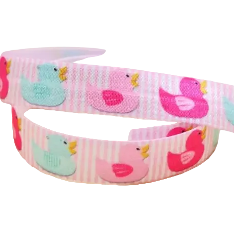 Ponto Baha softband hearing aid headband cochlear implant with a repeating pattern of pink and light blue ducks.