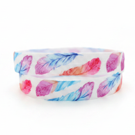 A close-up of a white elastic for cochlear implant hearing aid headband featuring a colourful watercolor feather pattern in shades of pink, purple, and blue.
