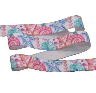 Ponto Baha softband hearing aid headband cochlear implant with a colorful seashell and starfish pattern, shown in a loop on a neutral gray background.