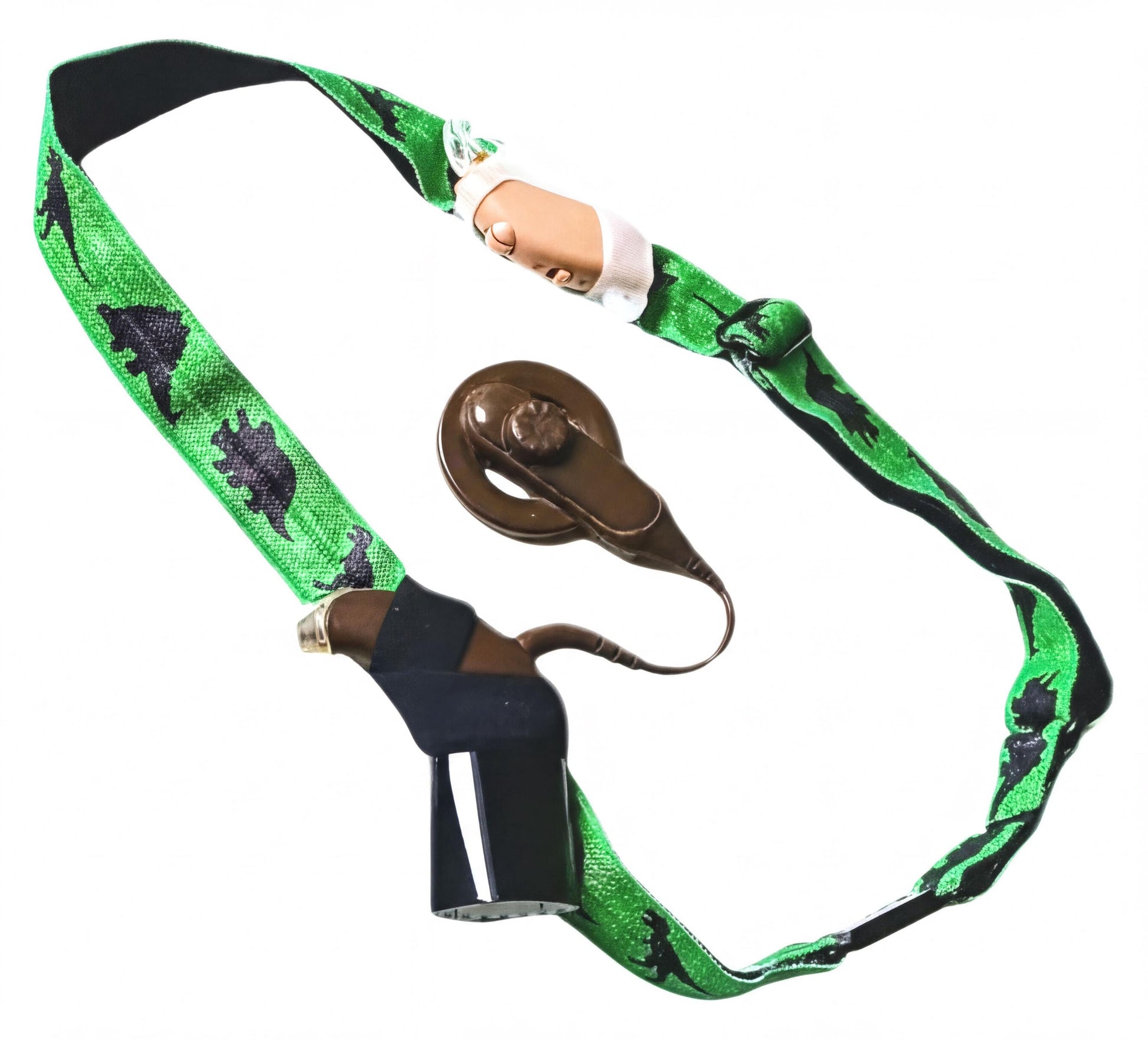 An adjustable headband featuring a green strap with black dinosaur silhouettes, with a cochlear implant and hearing aid.