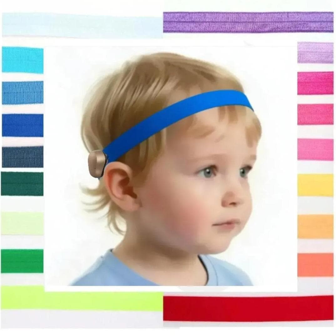 A young child wearing a bright blue elastic hearing aid headband, shown against a white background with vertical colour swatches in multiple hues around the border.