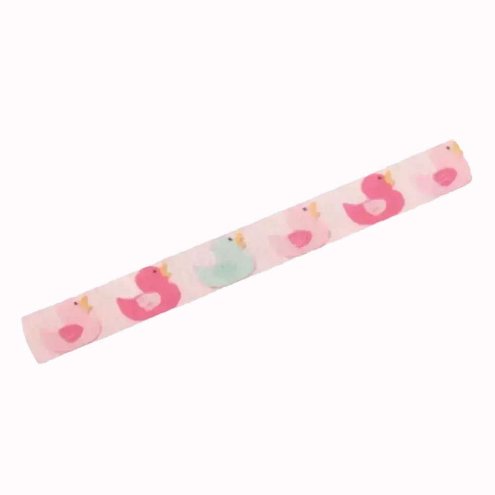 elastic for hearing aid headband with a repeating pattern of pink and mint green ducks on a light pink background.