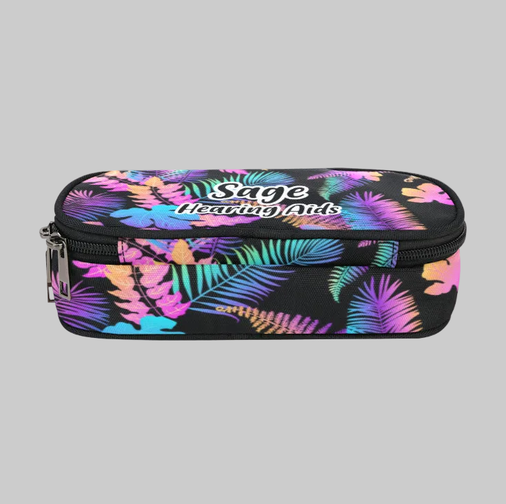 A rectangular zippered storage case for cochlear implants and Ponto baha devices with a black background and a vibrant tropical leaf pattern in neon pink, blue, green, and purple. The front features the text 'Stage Hearing Aids' in white script.