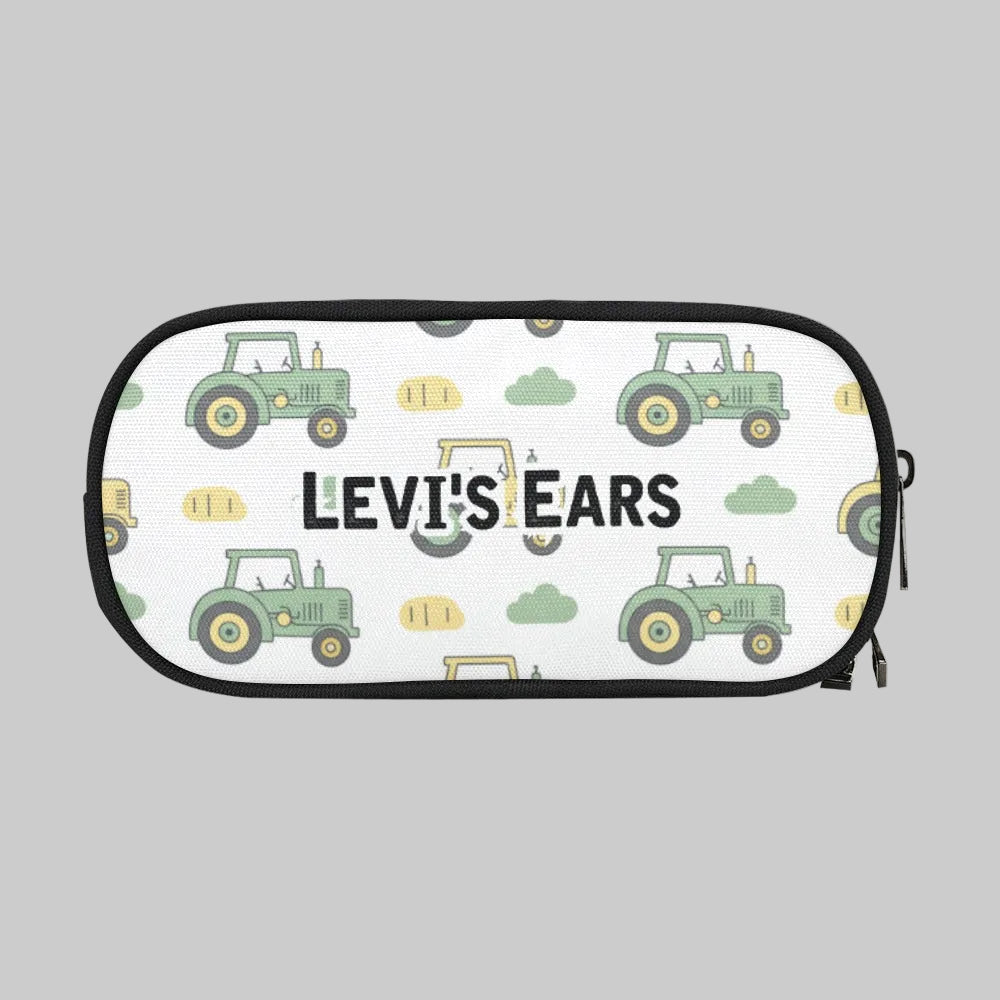 A zippered storage case for cochlear implant hearing aid Ponto baha devices with a white background and a repeating pattern of green tractors, yellow tractors, and green clouds. The text 'LEVI'S EARS' is printed across the center 
