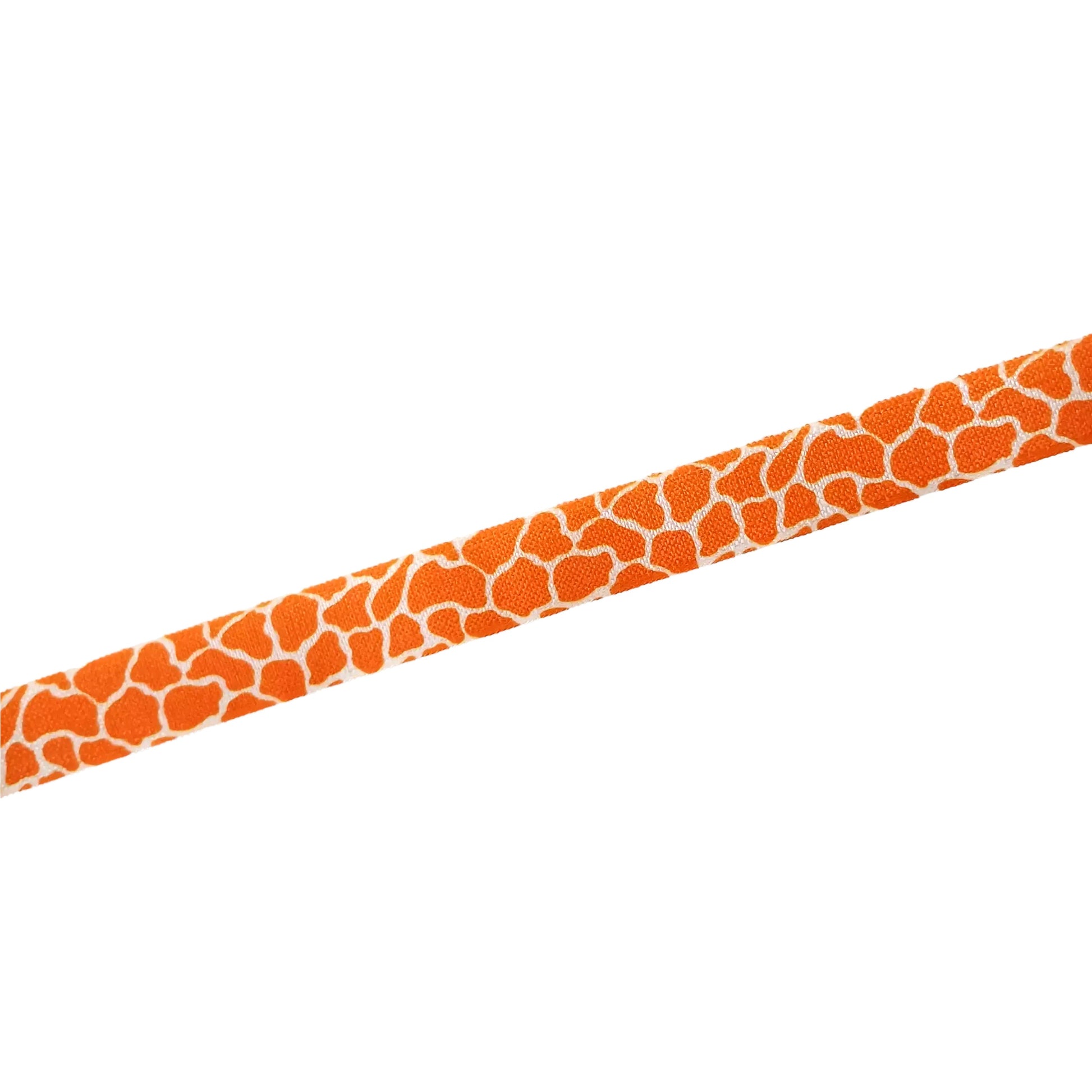 A long, orange and white patterned ribbon or band is shown against a white background.
